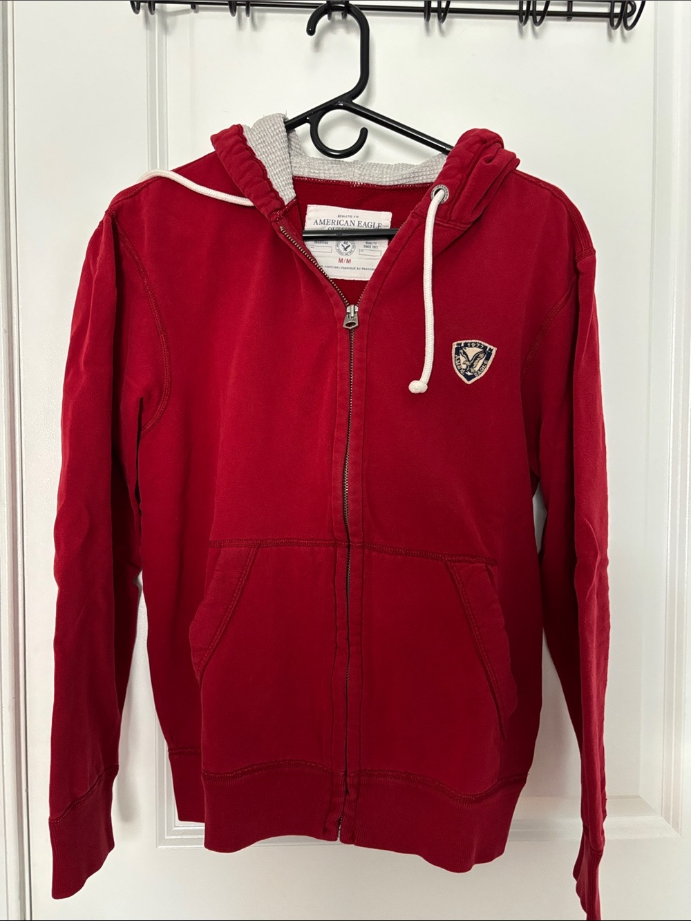 American Eagle Outfitters Red Zip Hoodie with Crest Patch